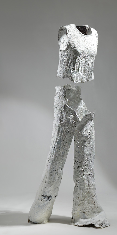 Frontal view of Alcesti's sculpture made by vintage white lace jumpsuit
